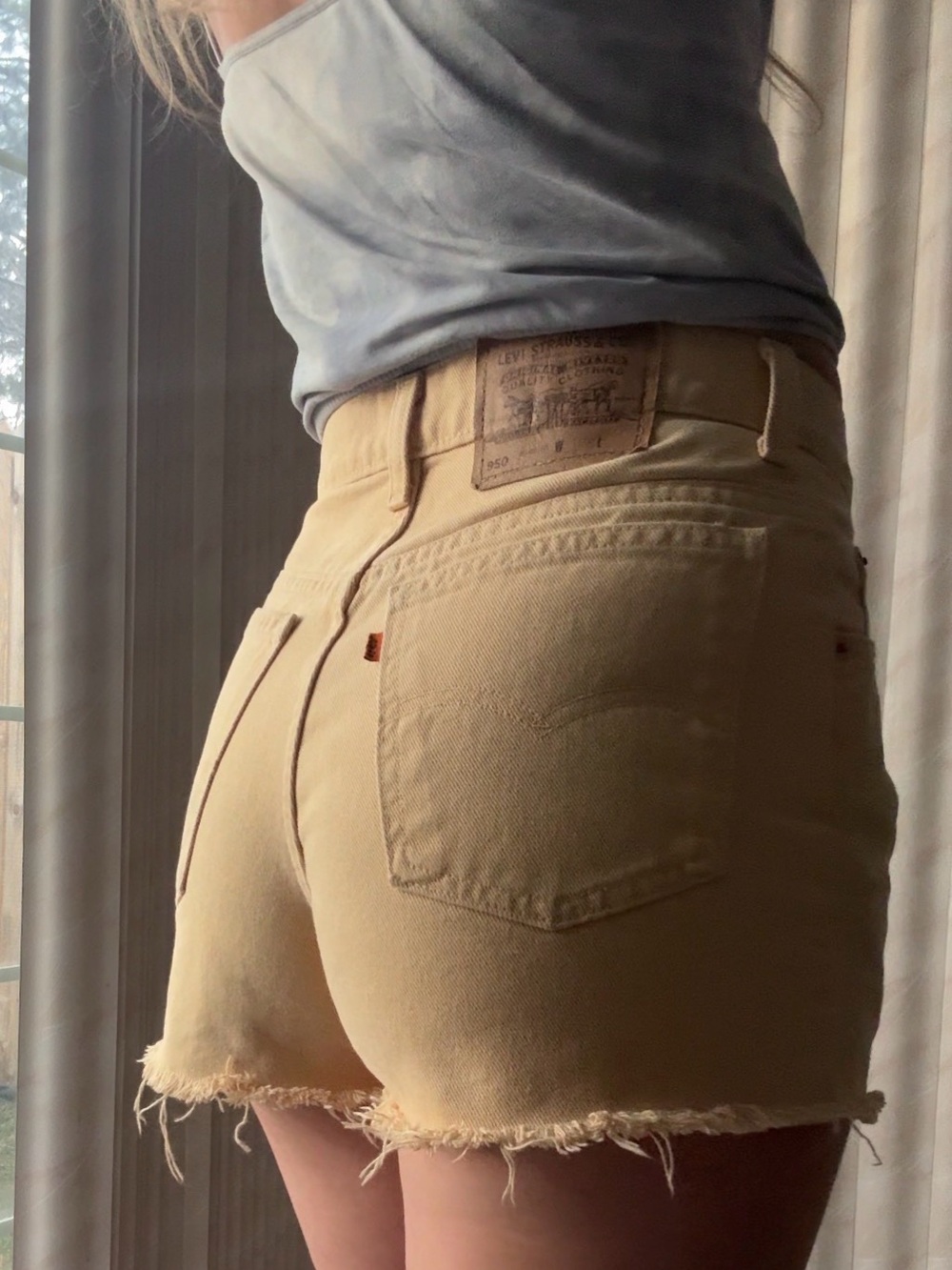 Vintage Levi's High-Waist Cut Offs in Pale Yellow